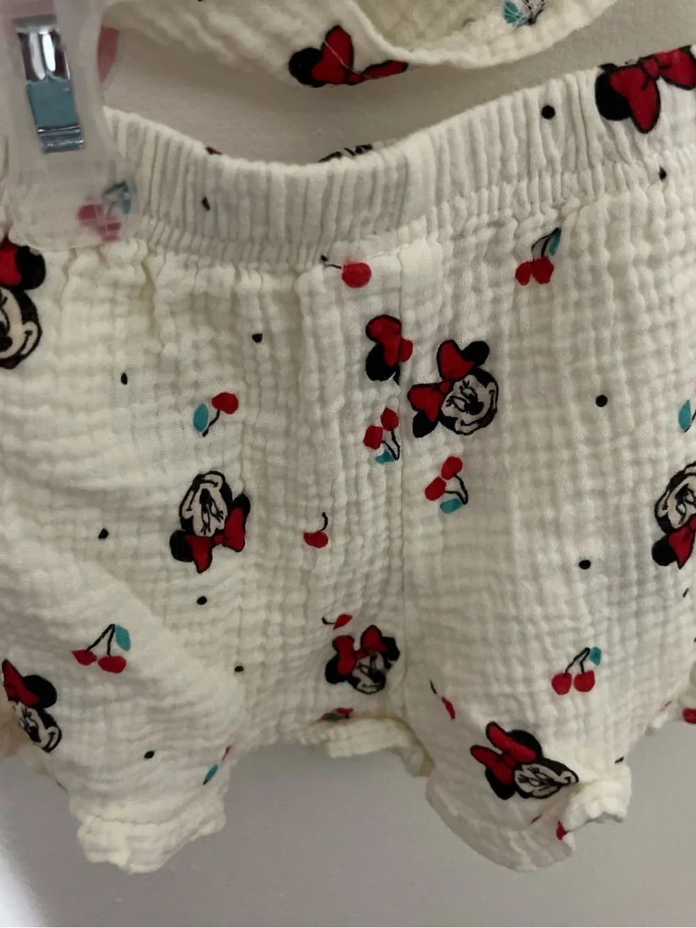 Disney Cream Baby Romper with Red and Black Minnie Faces and Teal Accents